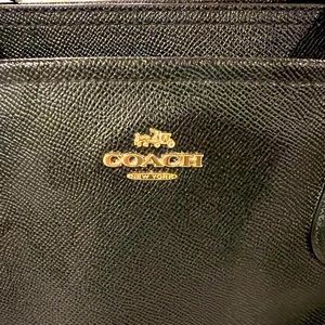 Coach work tote or baby bag.